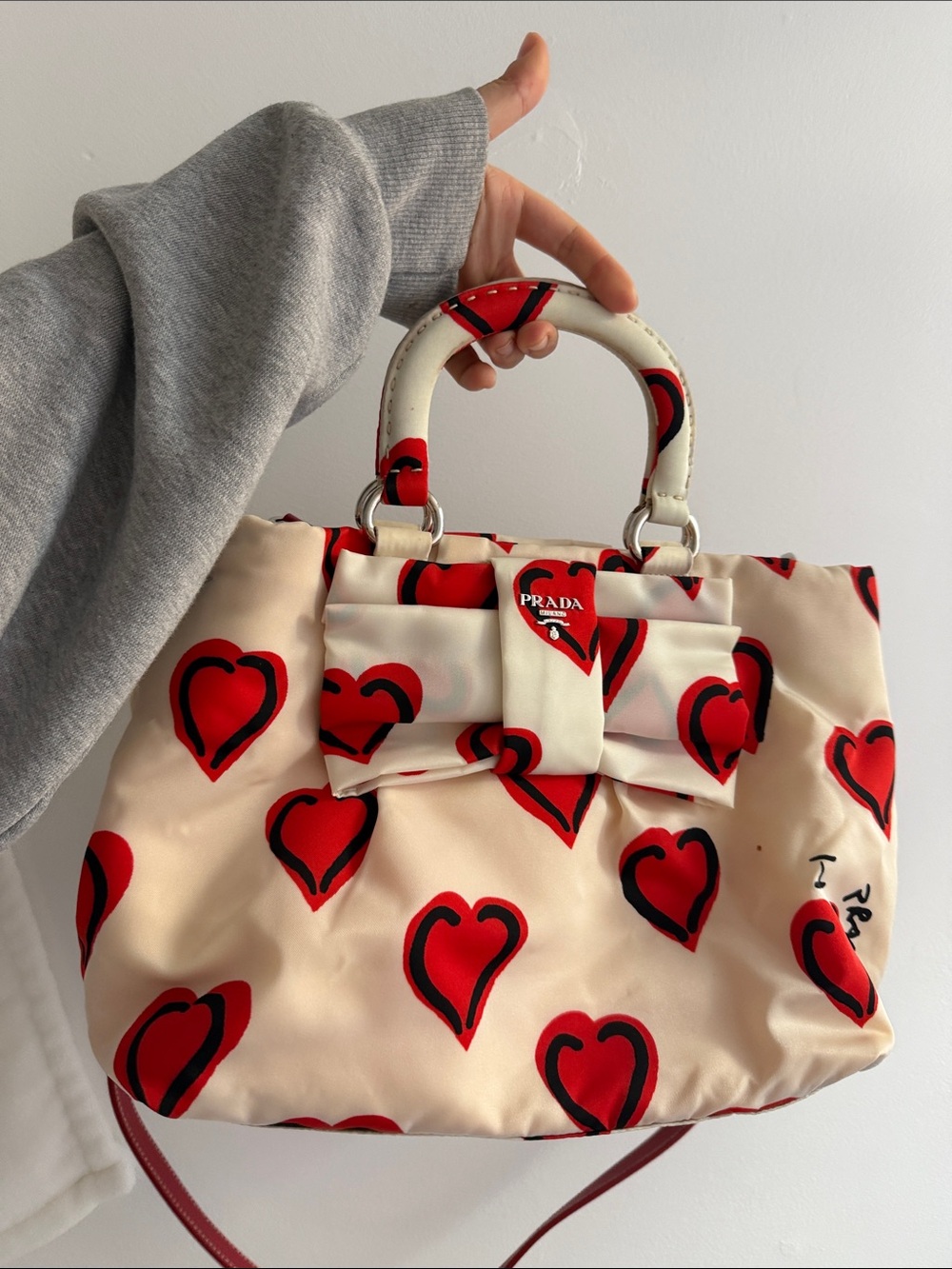 Prada White Tote with Red Heart Print and Bow Detail